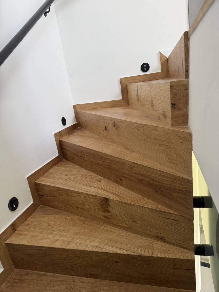 Detail of oak-clad winder stairs